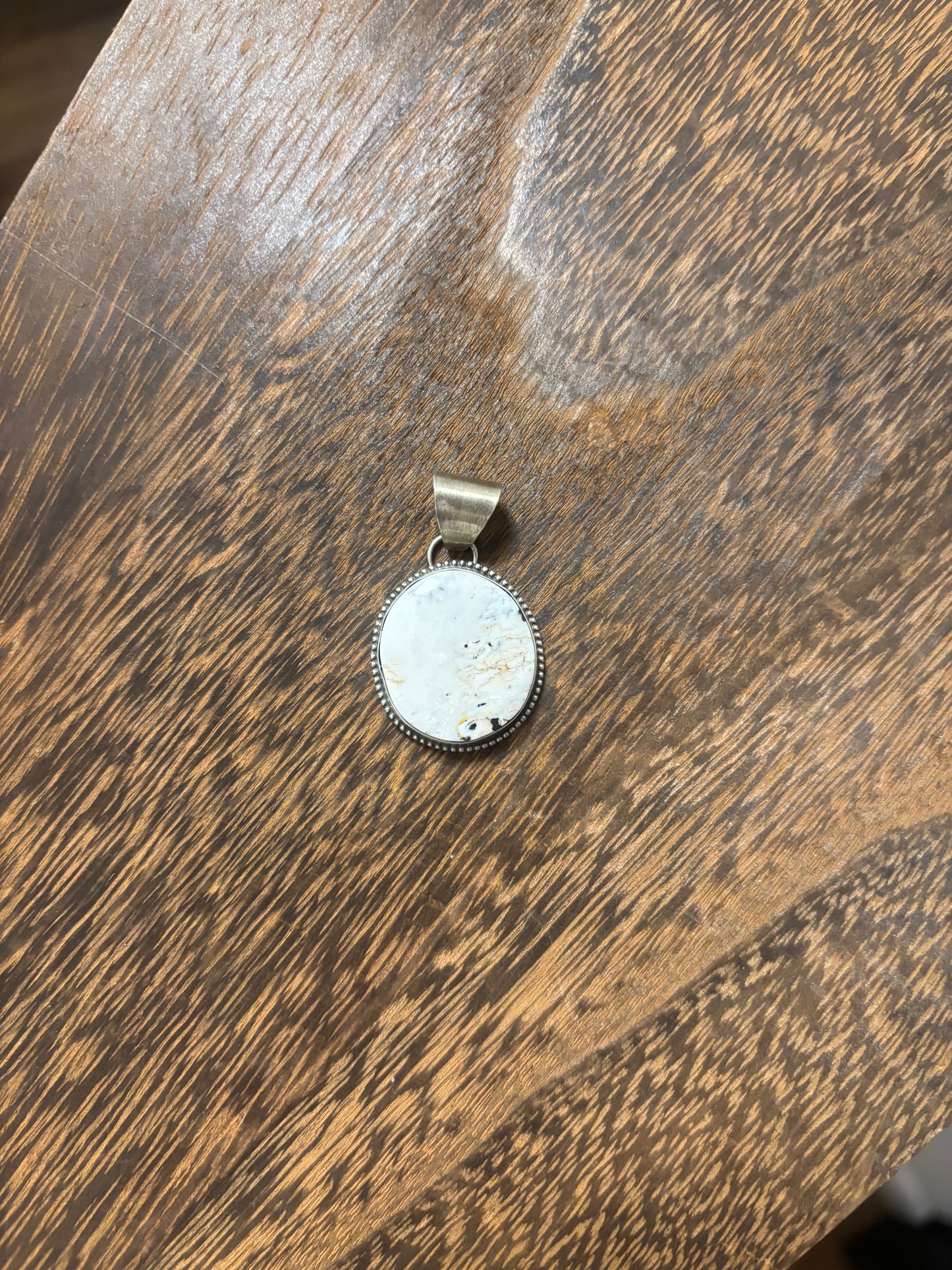 Gloria Rios white buffalo pendant
