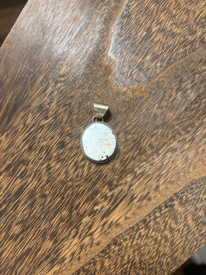 Gloria Rios white buffalo pendant