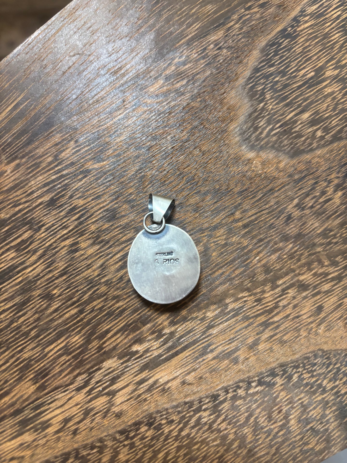 Gloria Rios white buffalo pendant