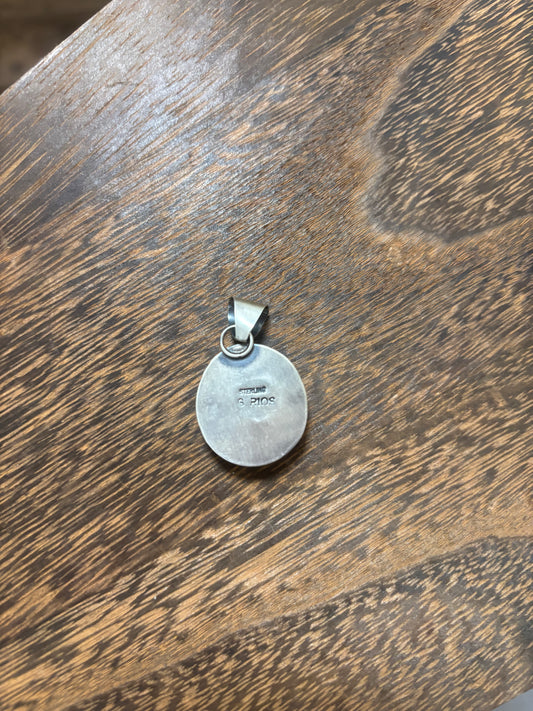 Gloria Rios white buffalo pendant